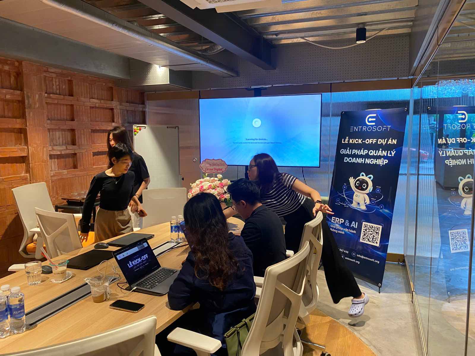 The ENTROSOFT and GBV Holding teams talking around the kick-off meeting table